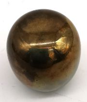 Piet Hein, Danish, (1905-1966), a mid century polished bronze 'Super Egg' in black leather pouch.