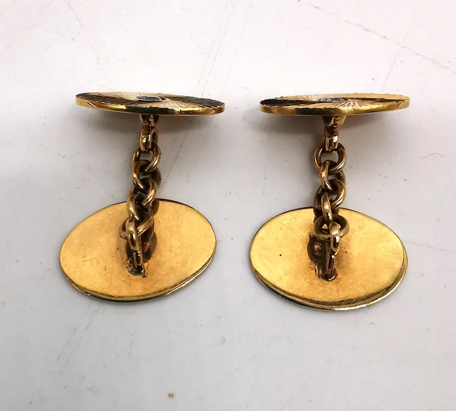 A red leather cased pair of 1920s 18ct yellow gold chain link cufflinks, one panel set with a - Image 5 of 7