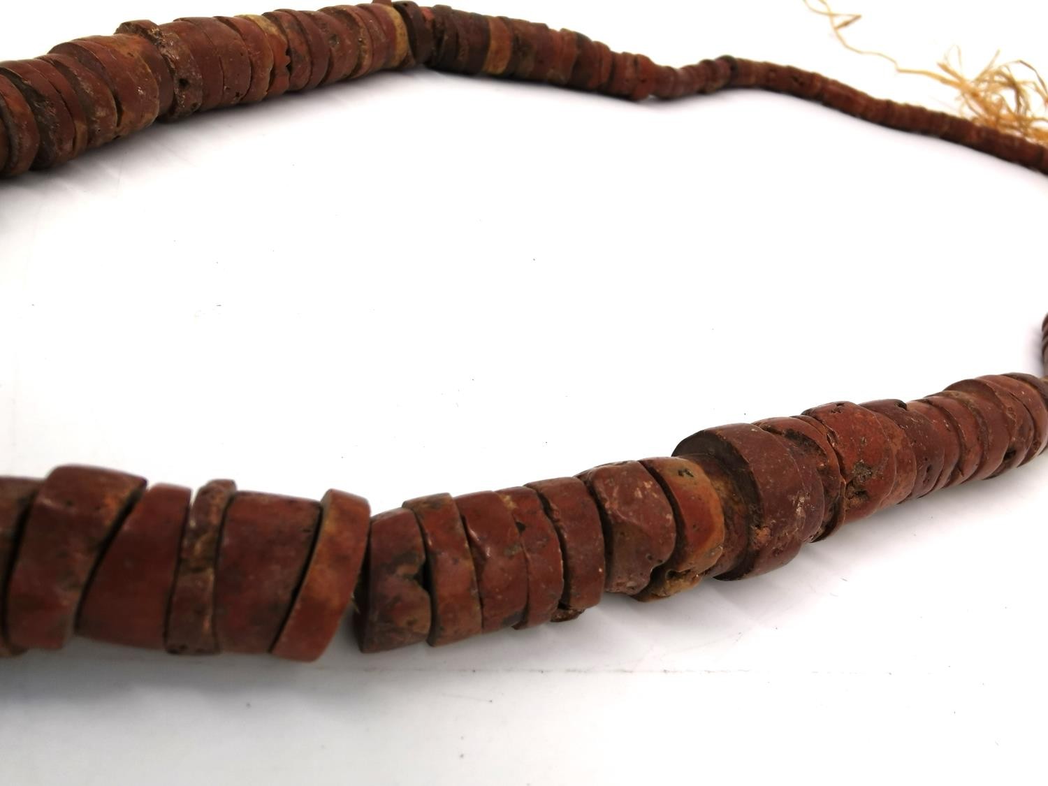 Four African Tribal Beaded Necklaces, one from Ghana comprised of graduated discs of Bauxite ( - Image 4 of 7