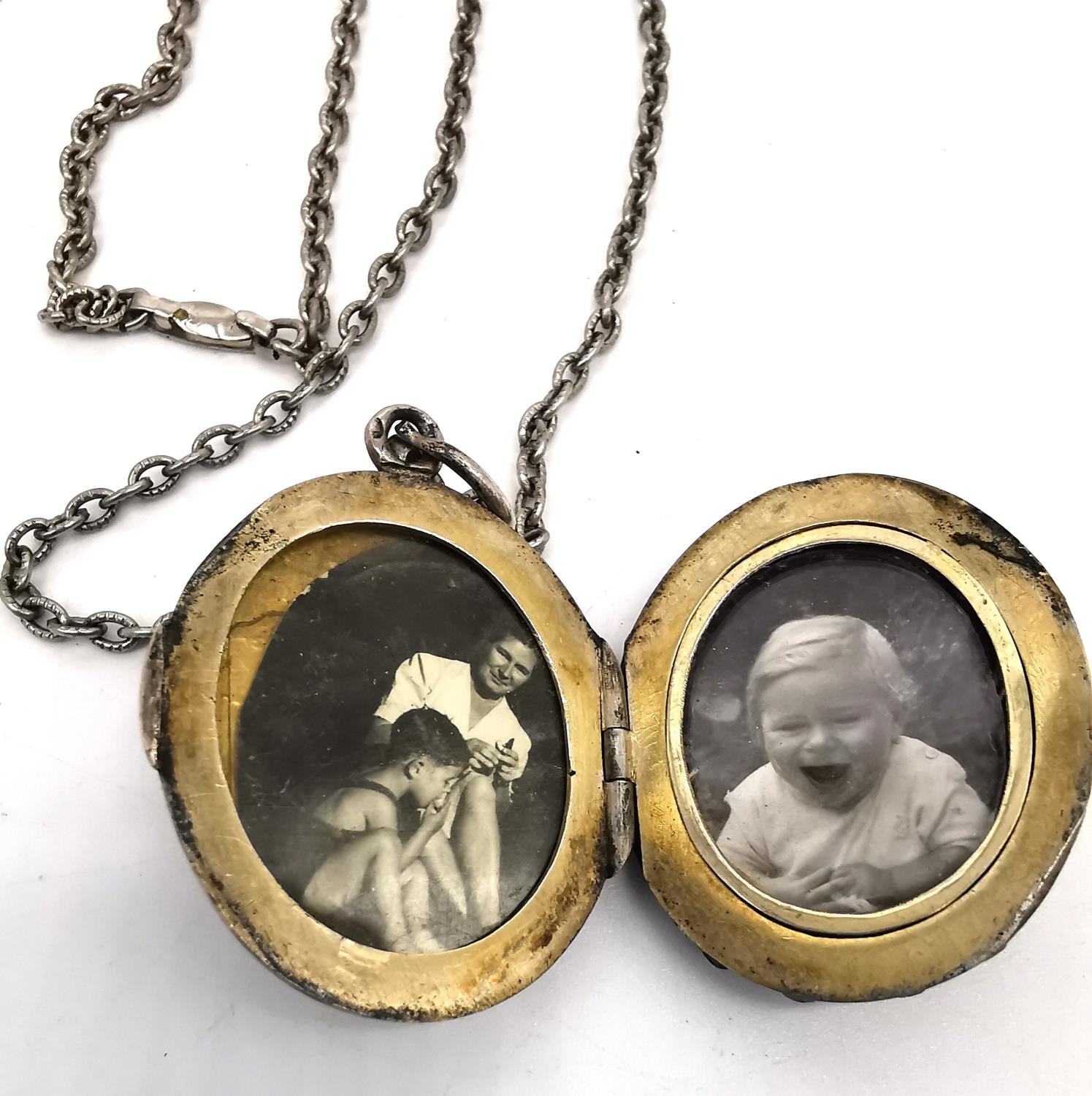 A 19th century white metal locket and metal chain. The front of the locket with an enamel plaque - Image 4 of 4