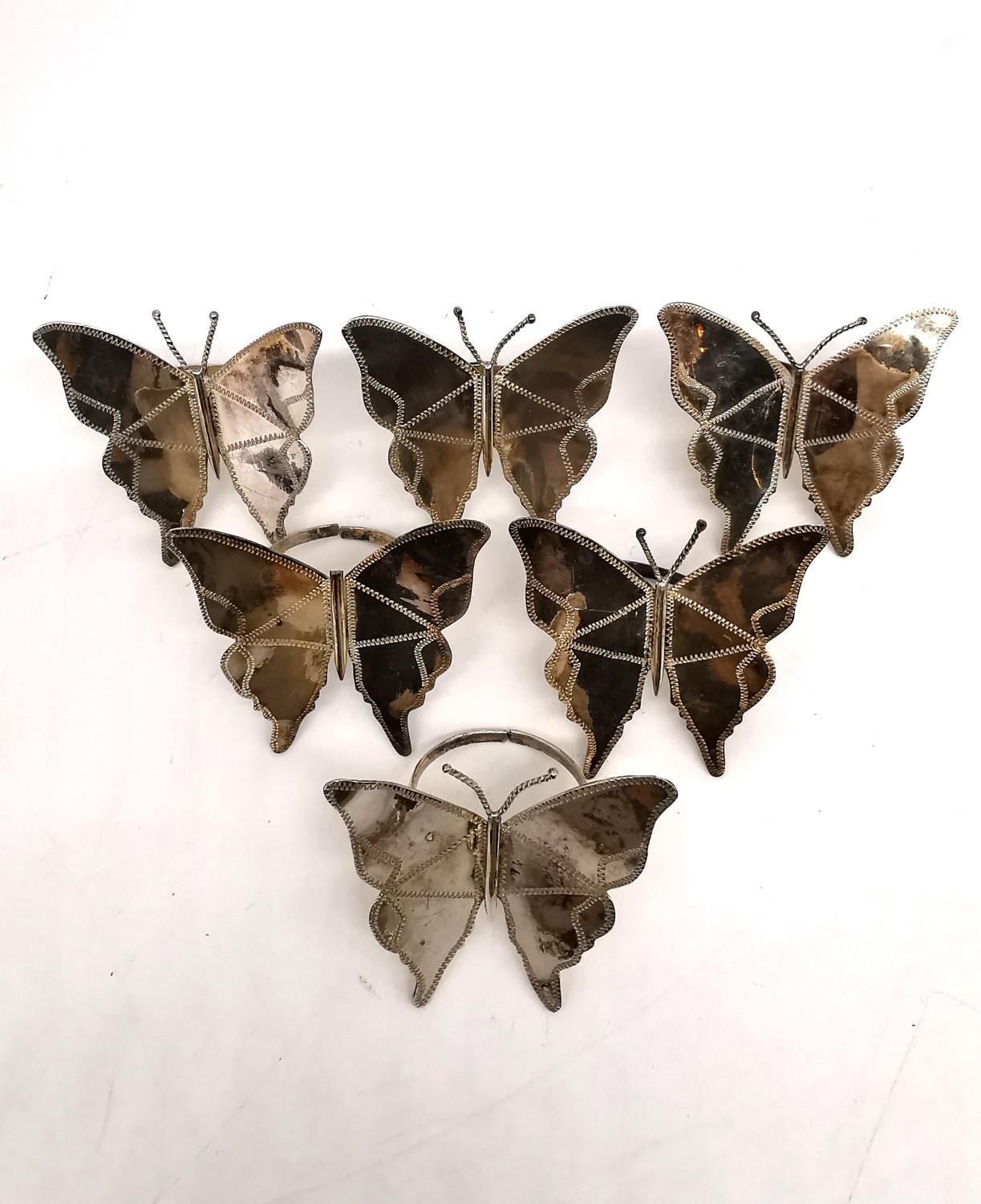 A set of six silver butterfly napkin rings with engraved detailing. Stamped silver to the wing. - Image 2 of 6