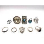 A collection of ten antique and vintage rings, including four silver rings, a brass and foil