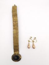 A rolled gold and black enamel Mourning bracelet along with a pair of 9ct and rolled gold screw back