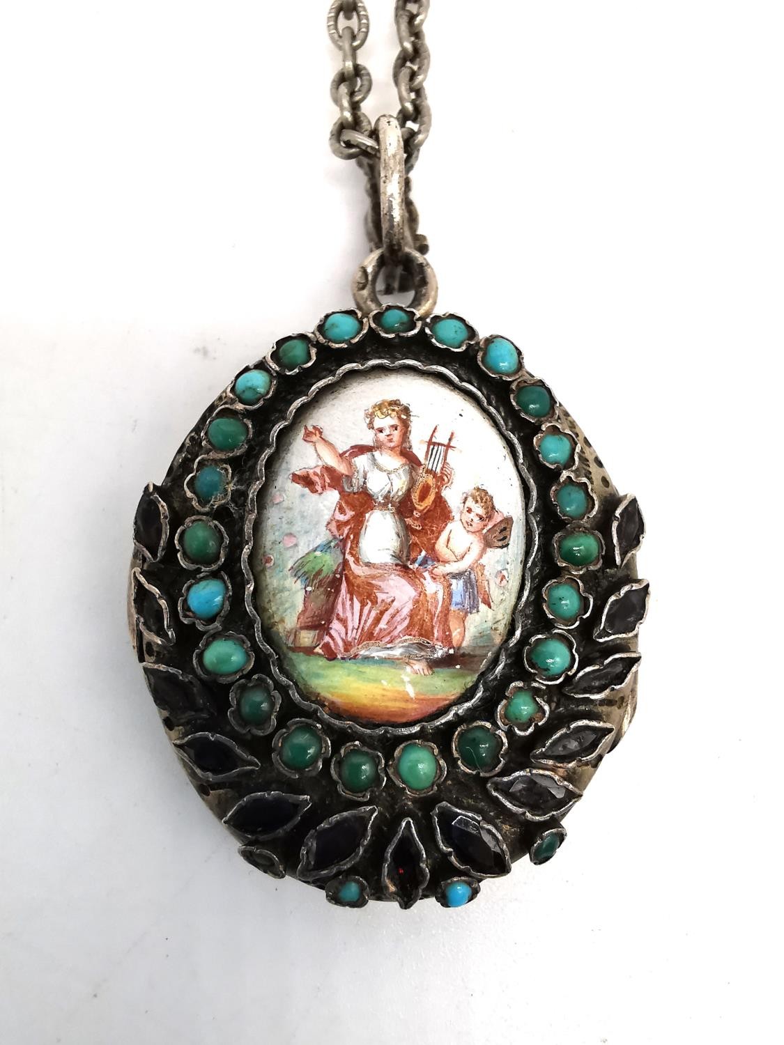 A 19th century white metal locket and metal chain. The front of the locket with an enamel plaque - Image 2 of 4