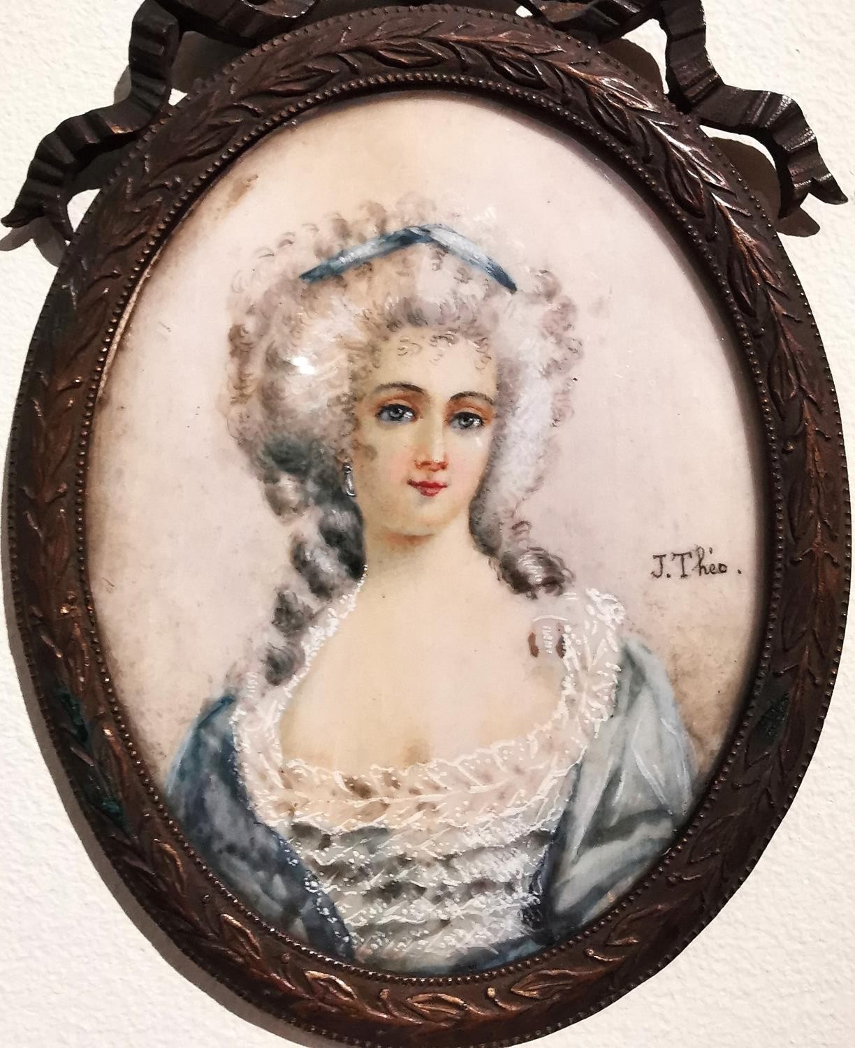 A brass framed and glazed 19th century portrait miniature of a lady in a blue silk dress with - Image 2 of 7
