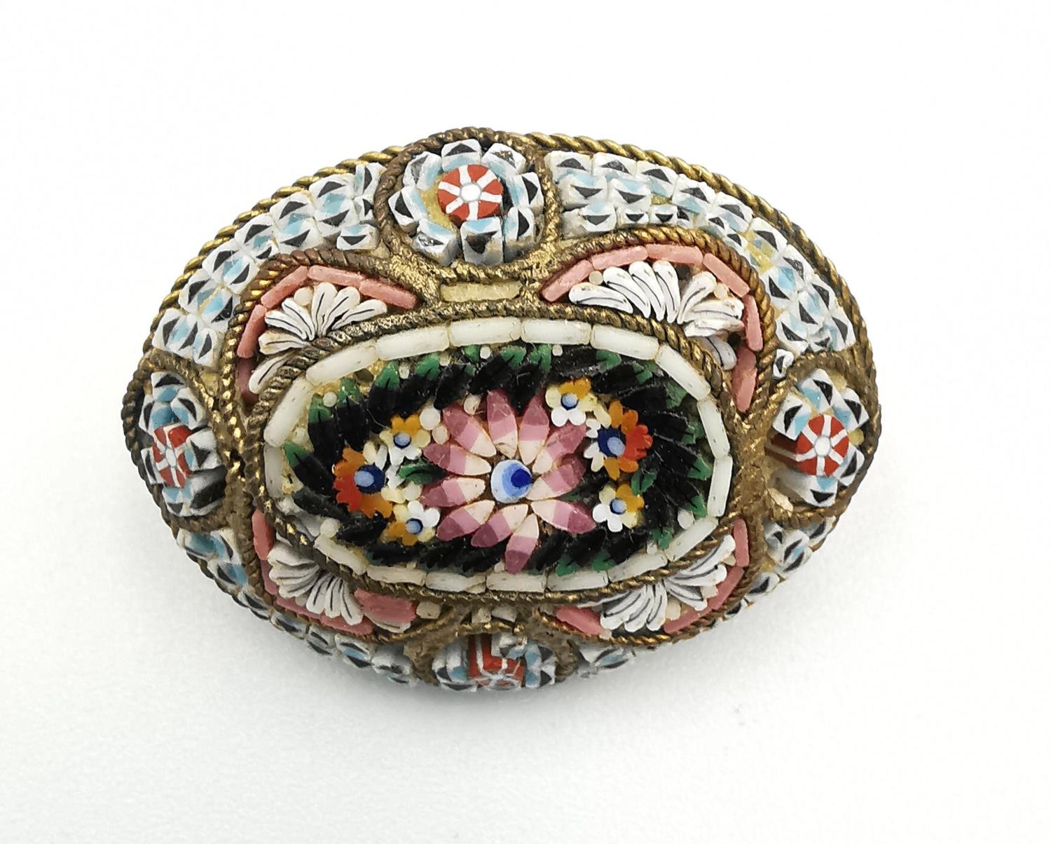 A collection of antique brooches, including a foil backed paste set red and white stone scrolling - Image 9 of 11