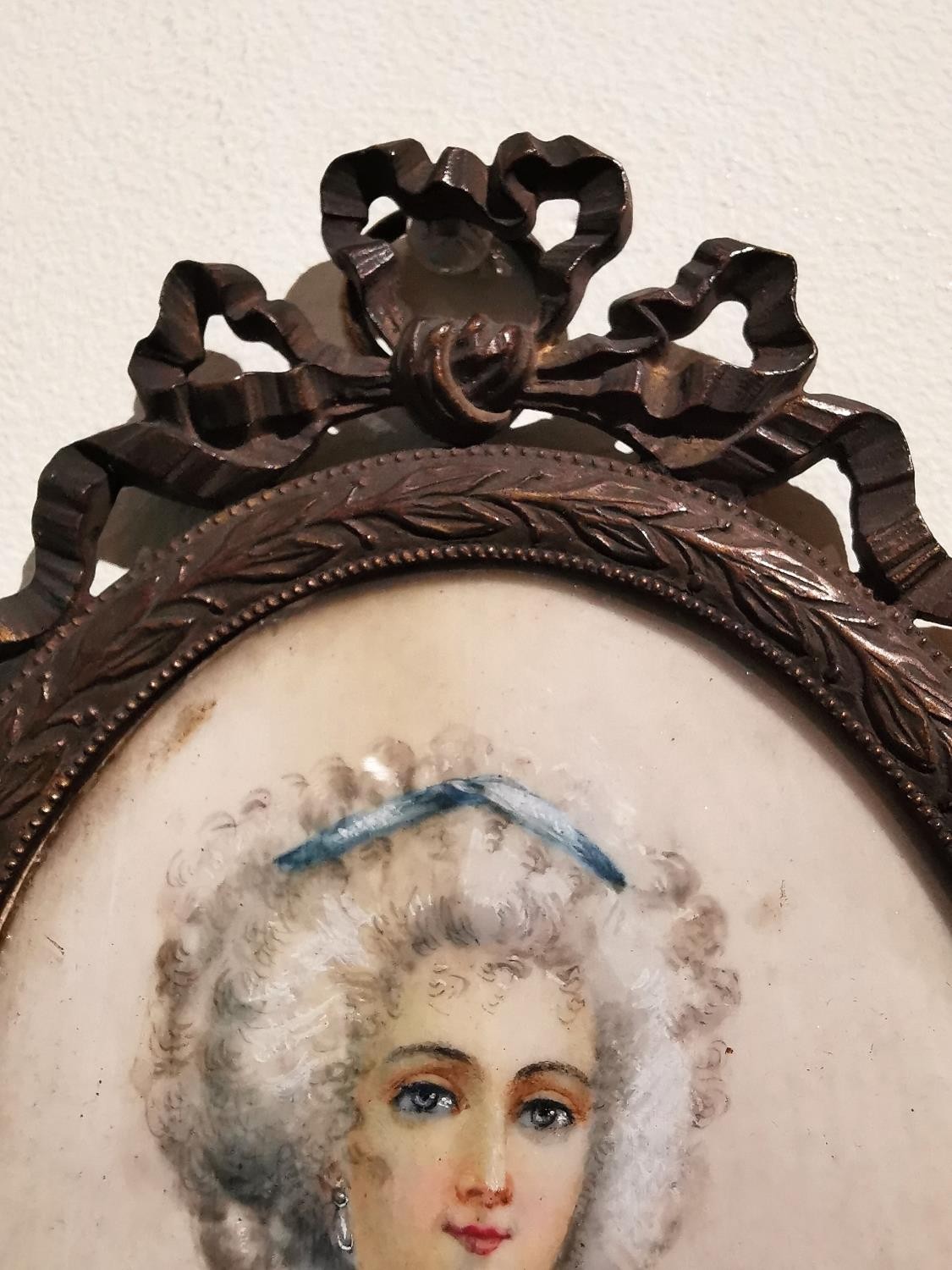 A brass framed and glazed 19th century portrait miniature of a lady in a blue silk dress with - Image 5 of 7