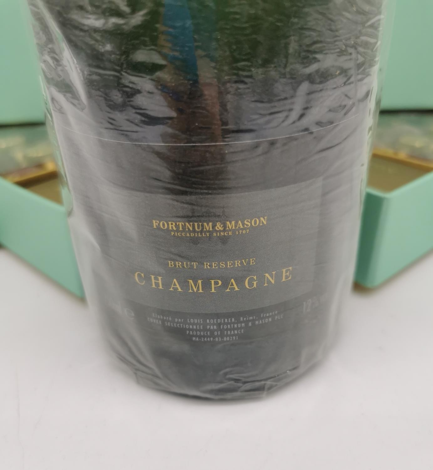 A Fortnum & Mason presentation boxed Champagne and truffles. Bottle of Brut Reserve. Unopened. H. - Image 3 of 3