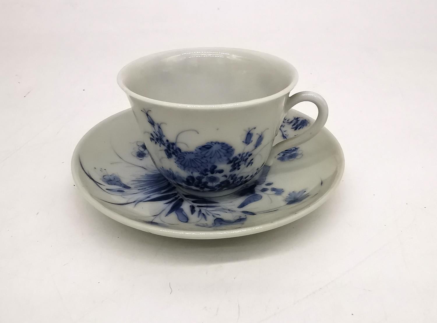 A Japanese 19th century hand painted porcelain small blue and white floral and foliate design teacup