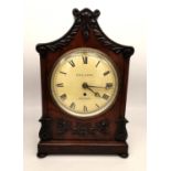 A 19th century mahogany mantle clock by Gill & Son of Aberdeen, brass movement and painted dial with