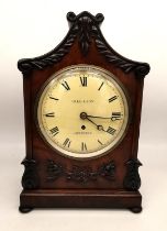 A 19th century mahogany mantle clock by Gill & Son of Aberdeen, brass movement and painted dial with