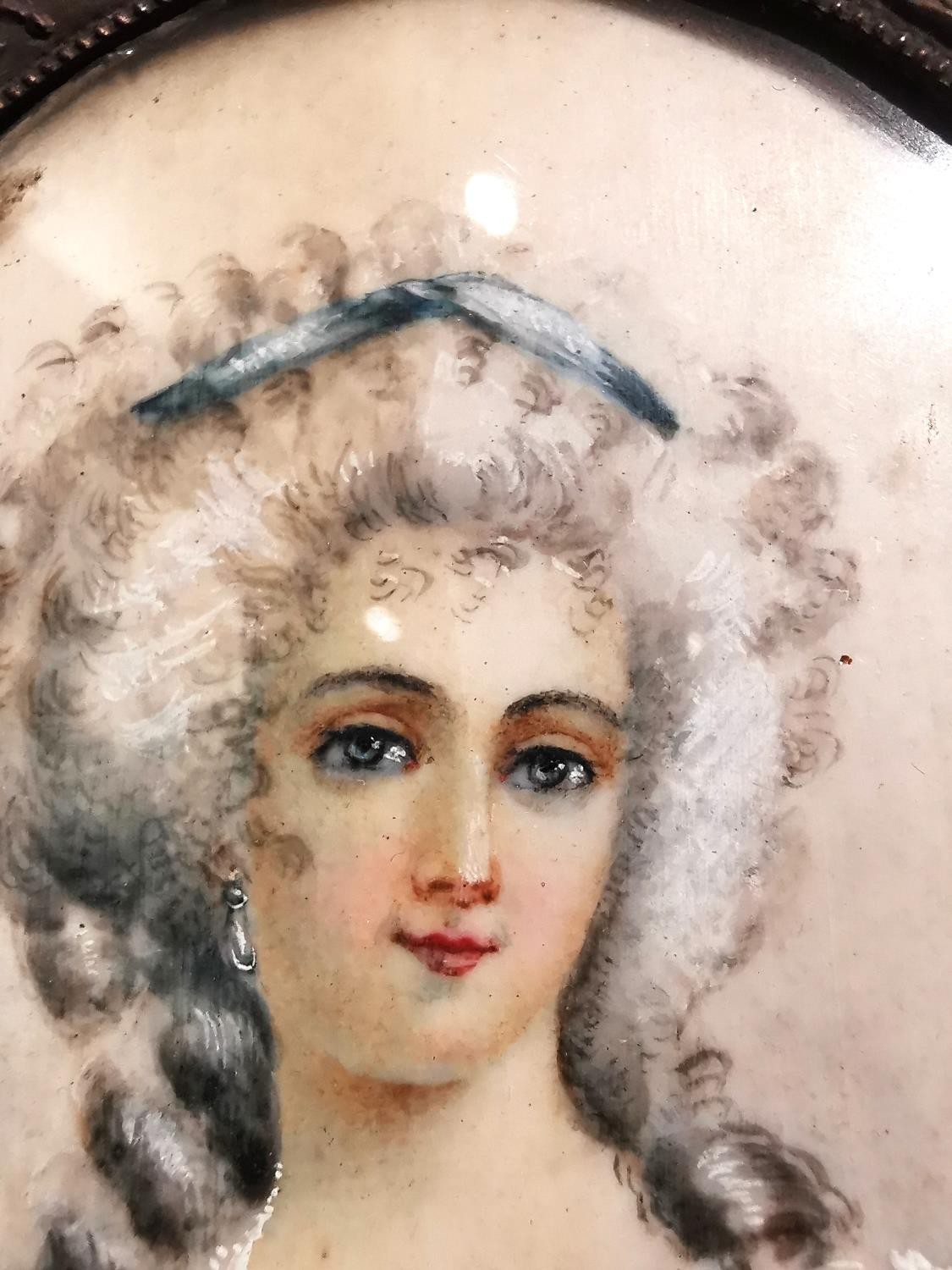 A brass framed and glazed 19th century portrait miniature of a lady in a blue silk dress with - Image 3 of 7