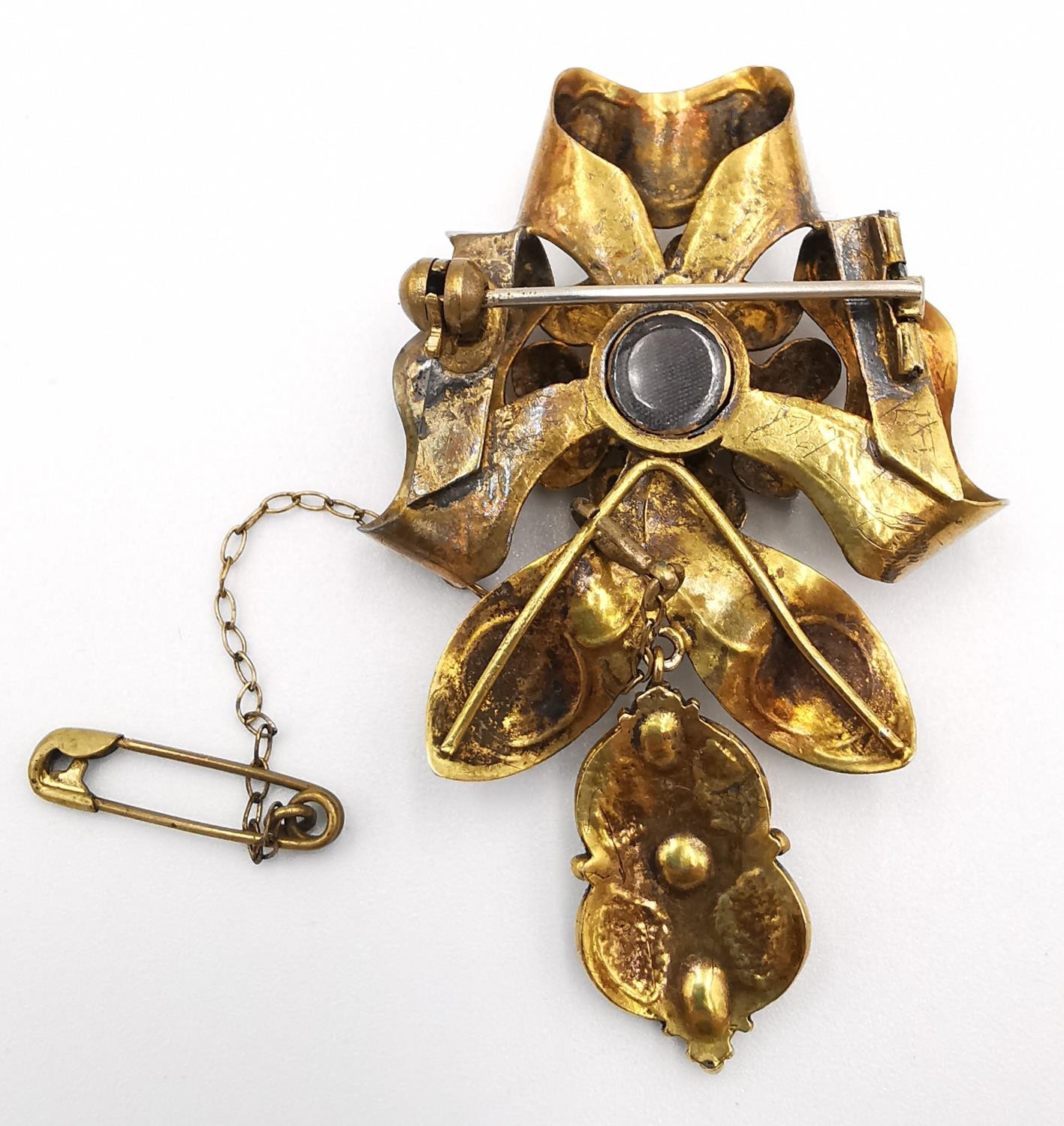 A 19th century yellow metal (tests as gold) sculptural floral design articulated brooch, set with - Image 5 of 6