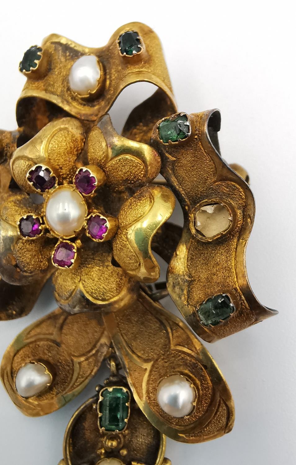 A 19th century yellow metal (tests as gold) sculptural floral design articulated brooch, set with - Image 4 of 6