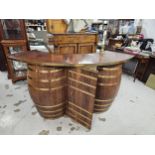 Home corner bar, mid century in the form of coopered oak barrels. H.110 W.210 D.60cm.