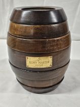 A Remy Martin barrel shaped games compendium. H.29 W.20 D.20cm.