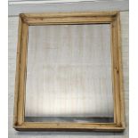Wall mirror, C.1900, pine frame with original plate. H.145 W.108cm.