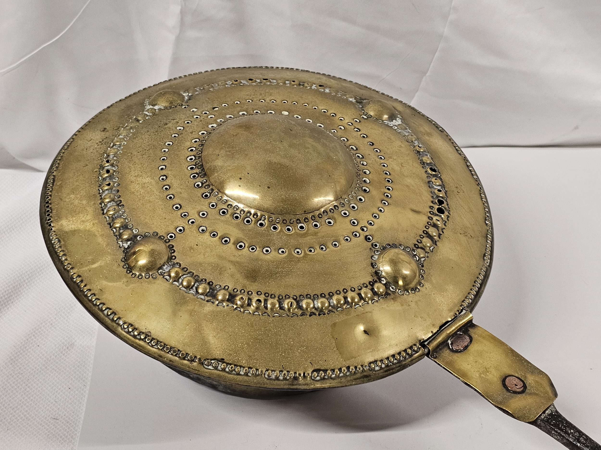 A 19th century brass chestnut roasting pan with boss detailing. L.100cm. - Image 2 of 3