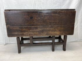 Dining table, 18th century oak with drop flap gateleg action. H.70 W.99 D.32cm. (extended W.98.5cm.)