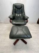 An Ekornes Somo reclining chair and stool in leather upholstery.