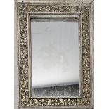 Wall mirror, contemporary in distressed silvered frame. H.112 W.77cm.