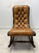 Rocking chair, 19th century style mahogany framed with deep buttoned leather upholstery. H.80cm