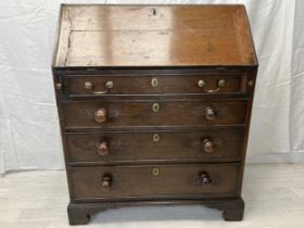 Bureau, 18th century oak. H.104 W.85.5 D.46cm.