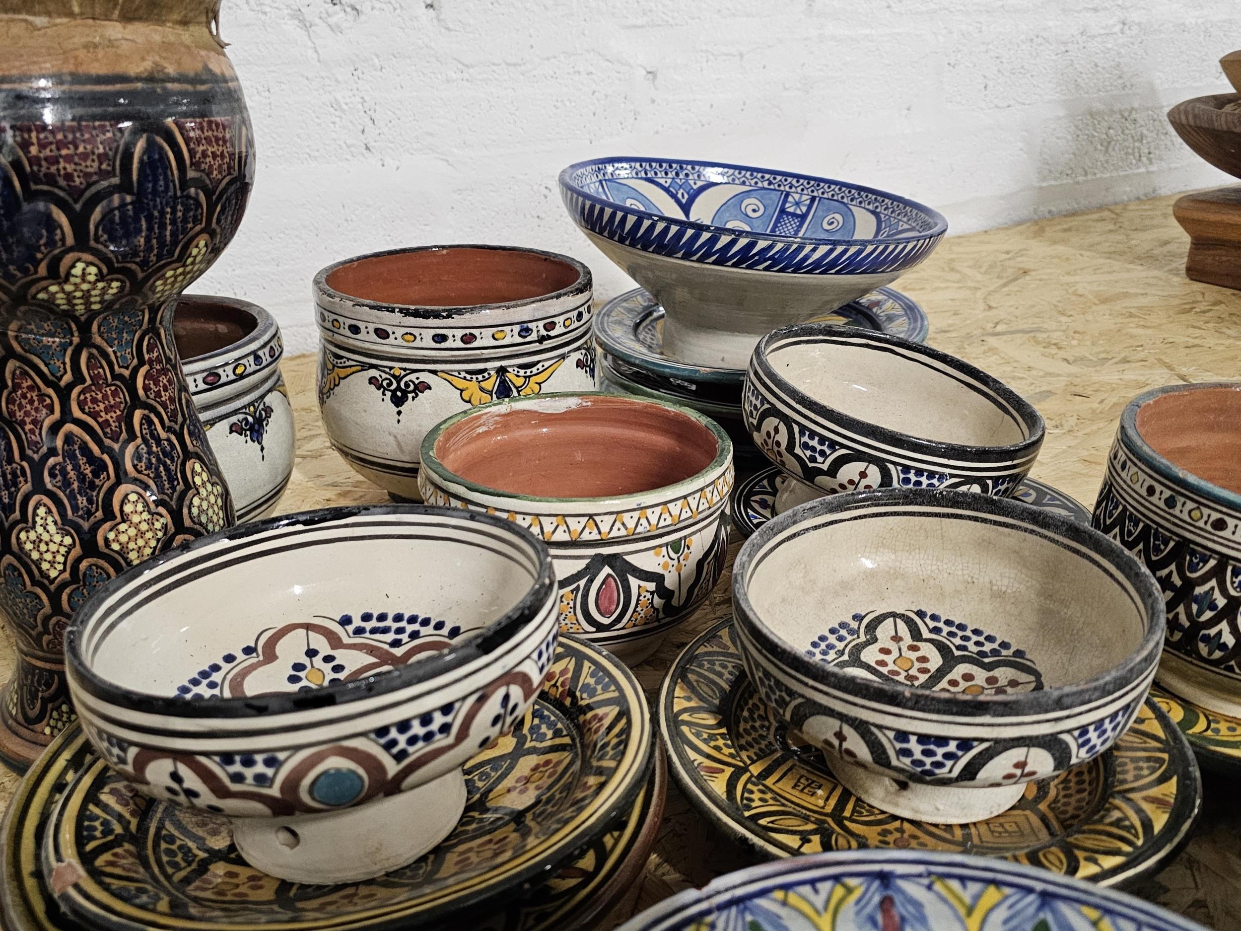A collection of Turkish and Moroccan hand painted ceramics, including bowls and large plates. Each - Image 3 of 3