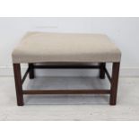 A 19th century mahogany framed footstool. H.42 W.73 W.52cm.