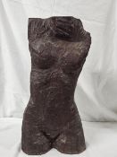 A carved hardwood female torso. Unsigned. H.60 W.28cm.