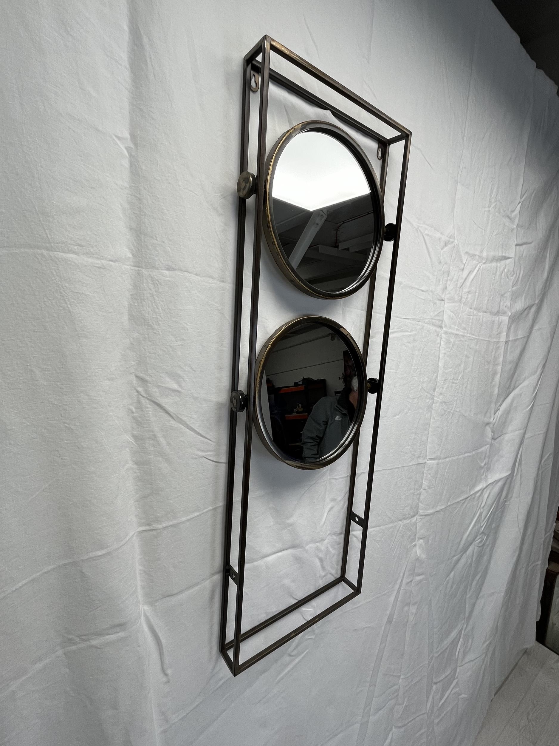 A contemporary metal framed swing mirror. H.90 W.31 D.5.5cm. - Image 2 of 2