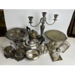 A mixed collection of silver plate to include candelabra, coffee set etc. H.35 W.34cm.