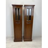 A pair of 19th century walnut north European pedestal display cabinets. H.129 W.33 D27cm