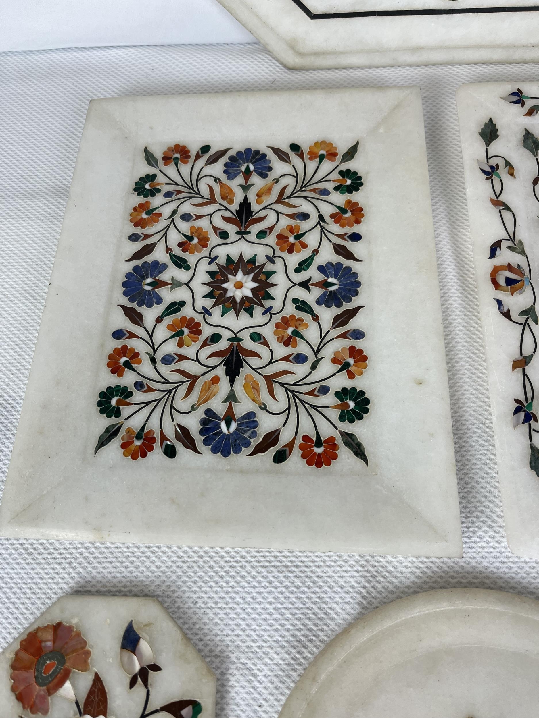 A collection of Indian pietra dura, a variety of semi- precious stones in white marble. Seven - Image 4 of 8