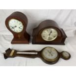 An Edwardian mahogany inlaid balloon mantle clock, an early 20th century mantel clock and a mahogany