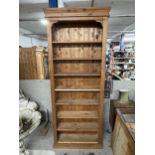 Open bookcase, full height 19th century style pine. H.259 W.97 D.32cm.