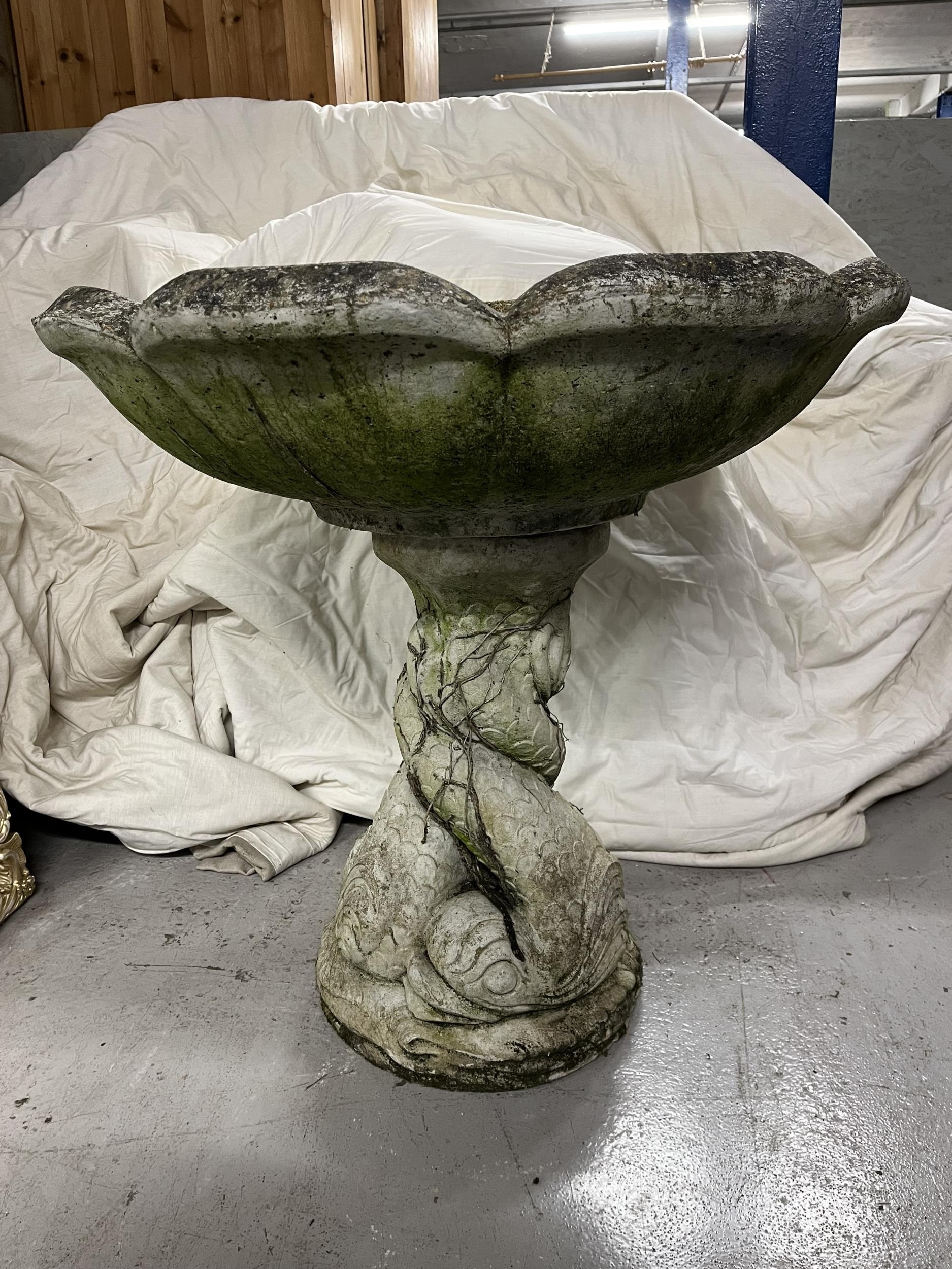 A reconstituted stone fountain, in three sections. H.84 W.85cm