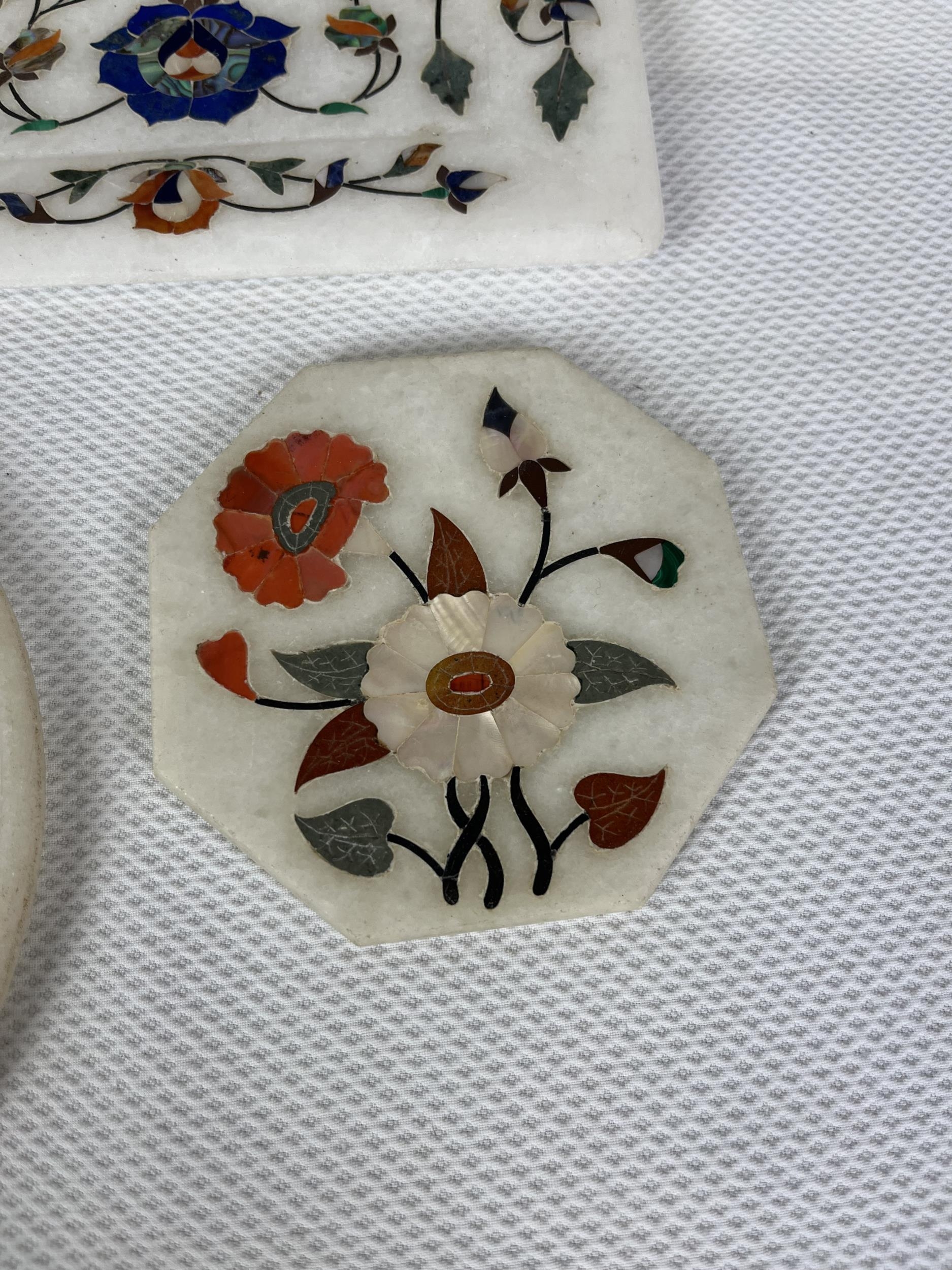 A collection of Indian pietra dura, a variety of semi- precious stones in white marble. Seven - Image 7 of 8