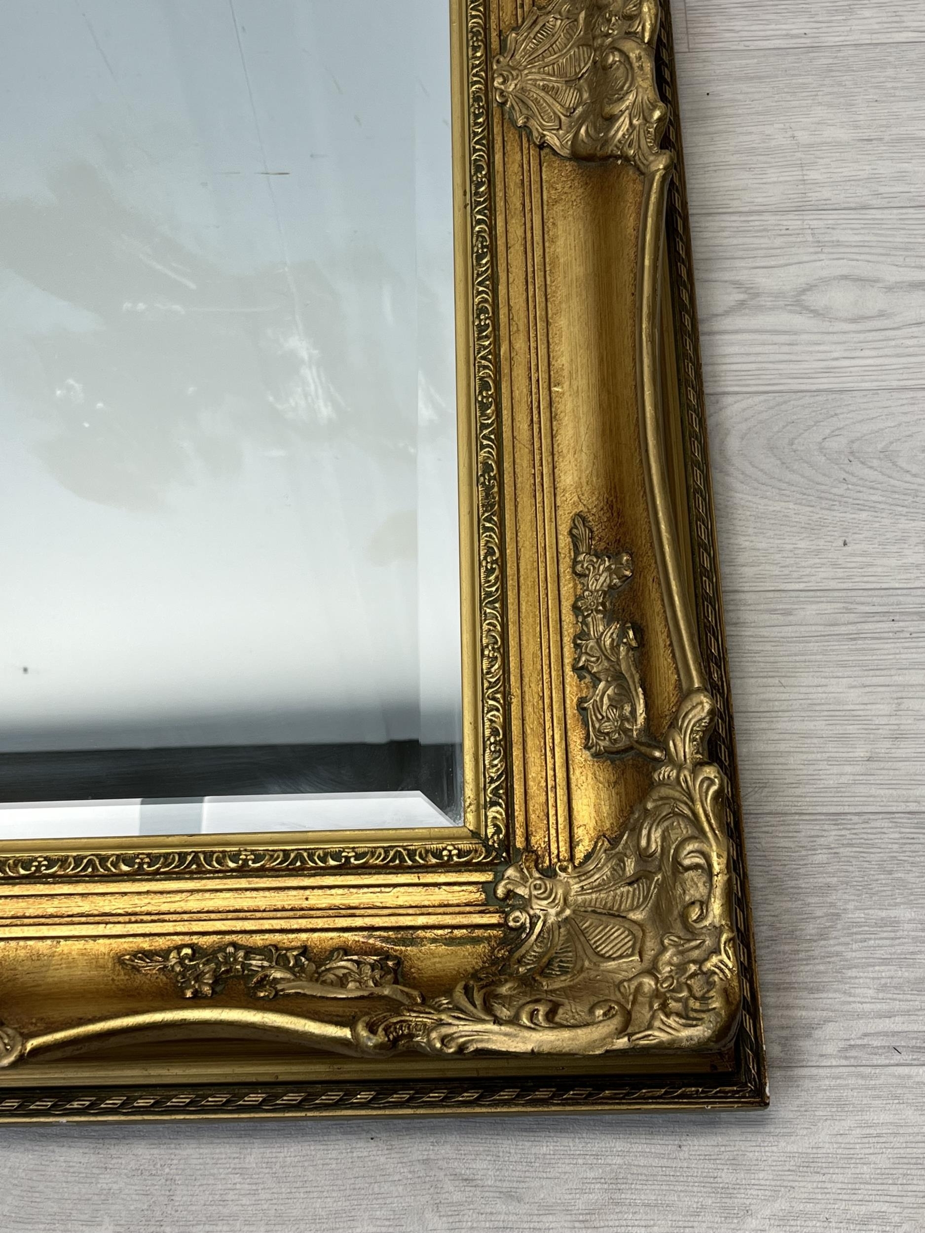 Wall mirror, contemporary foliate gilt frame with bevelled plate. H.96.5. W,71cm. - Image 2 of 4