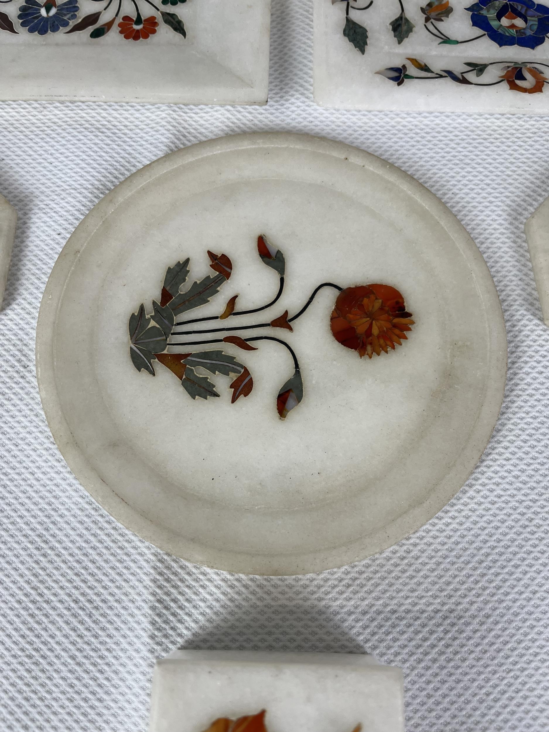 A collection of Indian pietra dura, a variety of semi- precious stones in white marble. Seven - Image 6 of 8