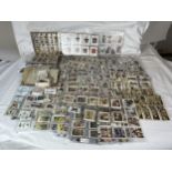 A very large quantity of cigarette cards, possibly over 2,000, all in sleeves along with a