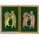 An identical pair of mounted Eastern relief plaques, one copper and the other brass. H.49 W.33cm.