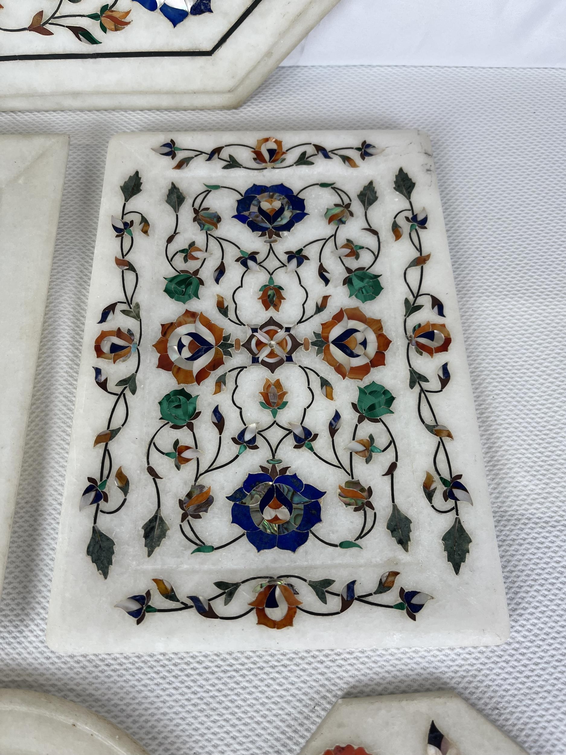A collection of Indian pietra dura, a variety of semi- precious stones in white marble. Seven - Image 3 of 8