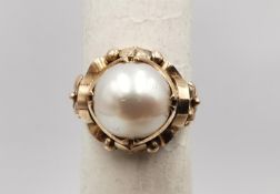 A vintage Chinese 18 carat rose gold and white cultured pearl dress ring, set with a round white