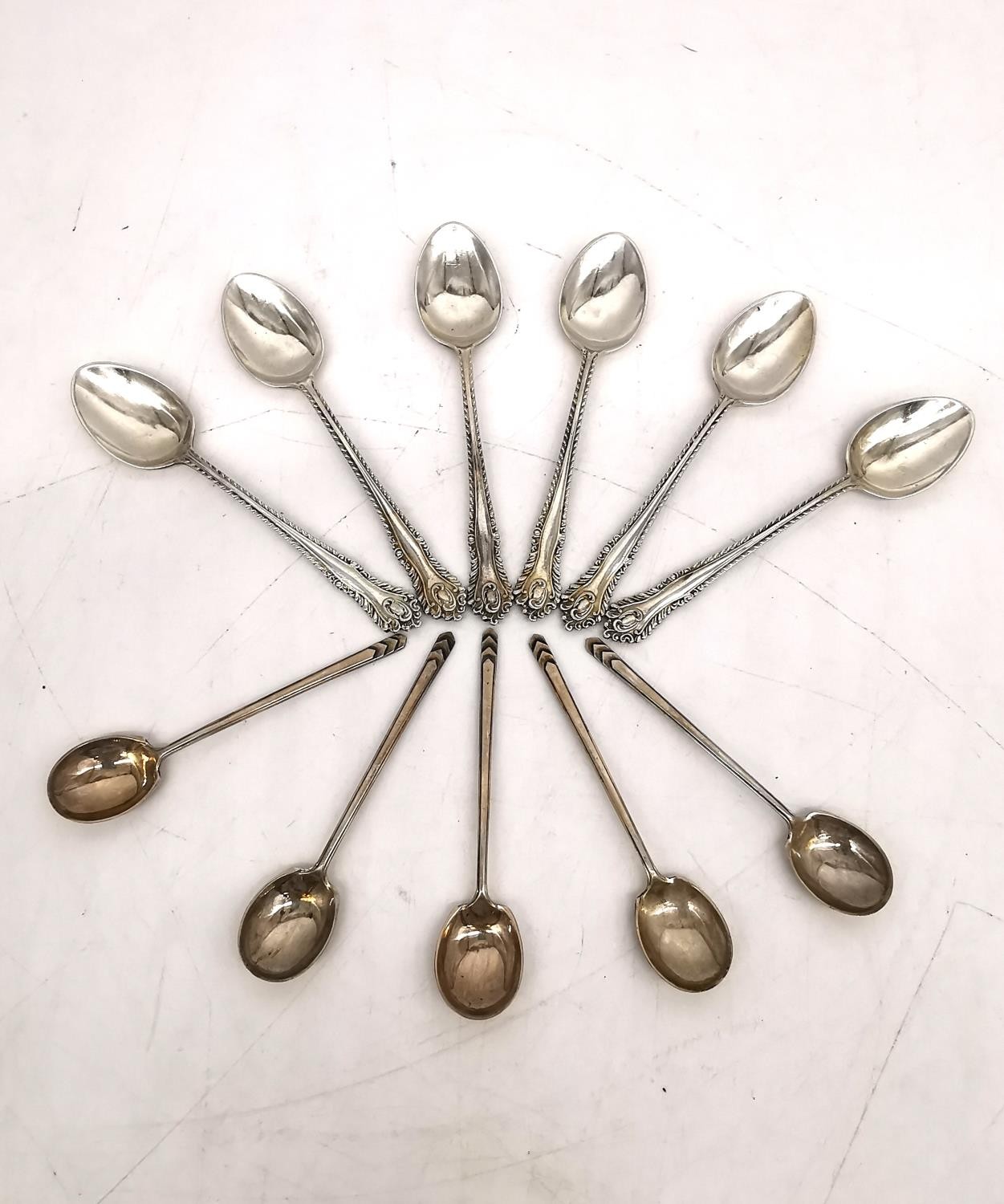 A leather cased set of six silver coffee spoons, six repousse silver teaspoons and five Art Deco - Image 2 of 10