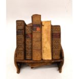 A signed Cartier Ltd. Miniature 'Reference Library' group of Cassell's dictionaries and Philips'