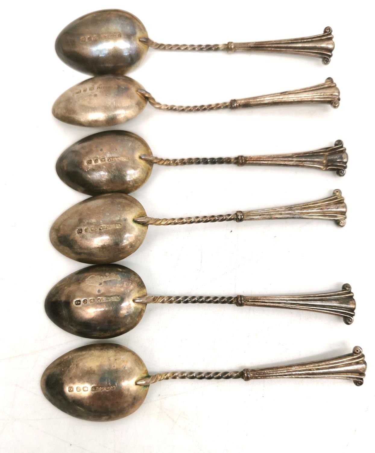 A leather cased set of six silver coffee spoons, six repousse silver teaspoons and five Art Deco - Image 9 of 10