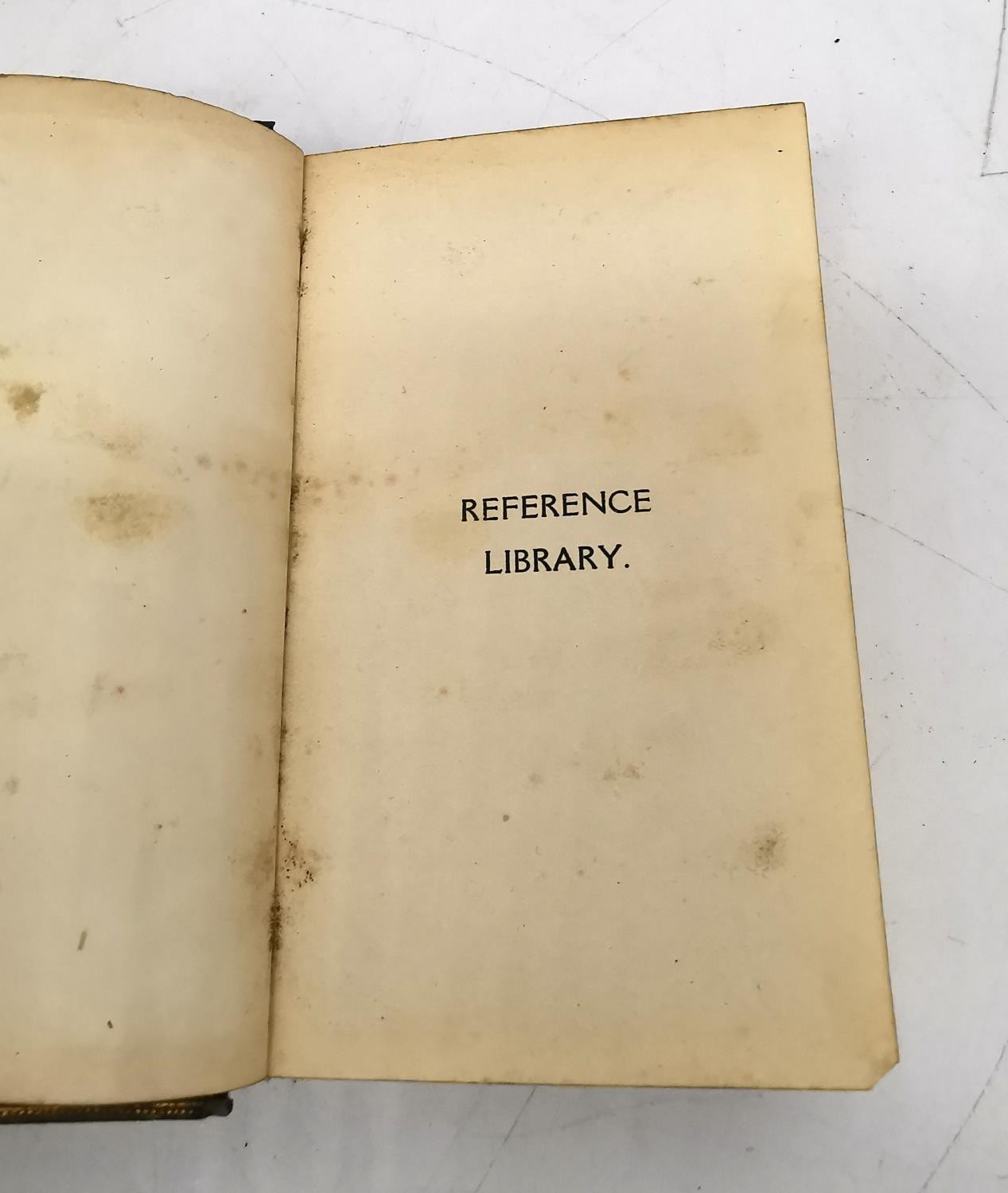 A signed Cartier Ltd. Miniature 'Reference Library' group of Cassell's dictionaries and Philips' - Image 33 of 37