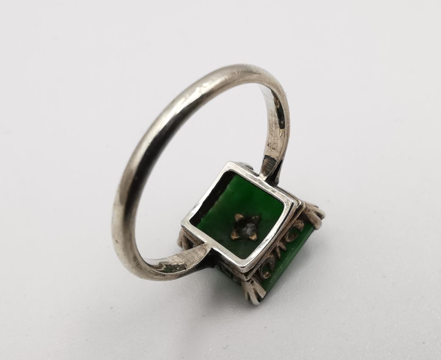 An Art Deco Chinese 14 carat white gold Jade and diamond dress ring. Set to centre of the square - Image 6 of 6