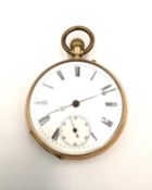 A 14 carat yellow gold Remontoir 15 rubis pocket watch with white enamel dial and black roman